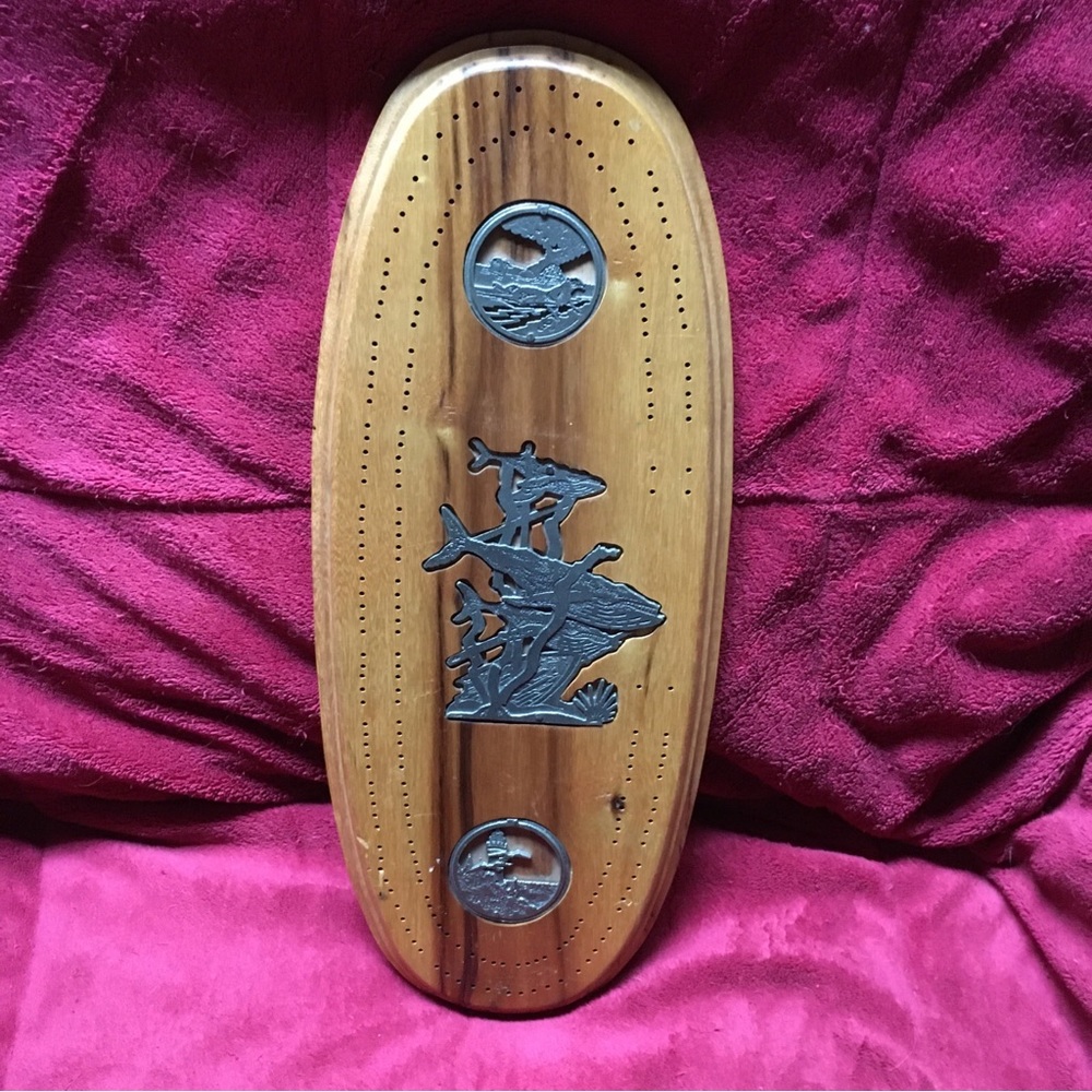 Custom made wooden and pewter inlay cribbage board